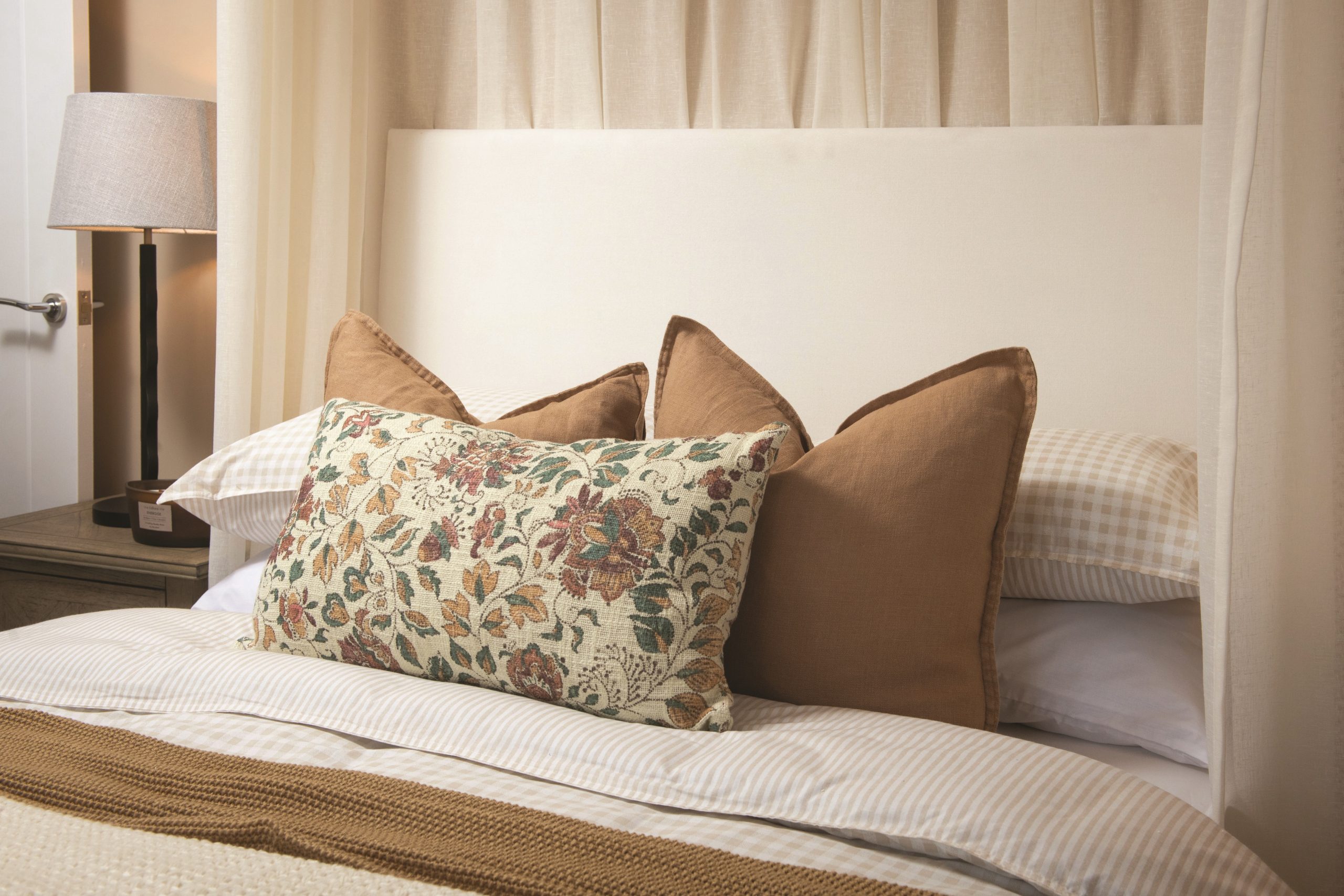 Floral Cushions on Double Bed